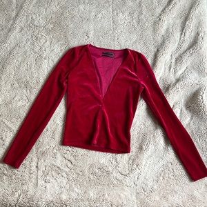 Urban Outfitters deep pinkish red, velvet deep v long sleeved shirt.